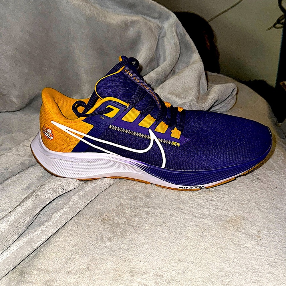 Nike. Purple and yellow. Size 11.5.